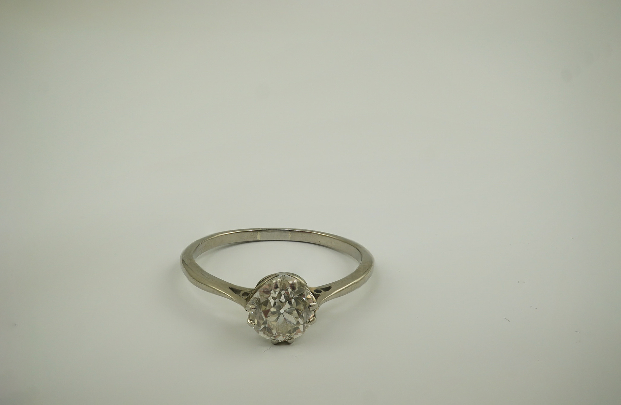 A platinum? and solitaire diamond set ring